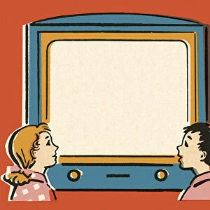 Boy and Girl Looking at a Television Screen