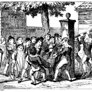 Boy being held under a water pump Boy being held under a water pump