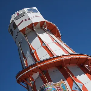 Bright Red and White Helter-Skelter with a Blue Summer Sky Bright Red and White Helter-Skelter with a Blue Summer Sky