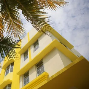 Bright yellow and white facade of residential building in Miami Beach, Miami, Florida