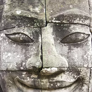 Buddha giant face carved in pillars Bayon Temple