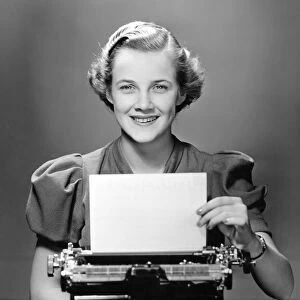 Business woman / secretary at typewriter
