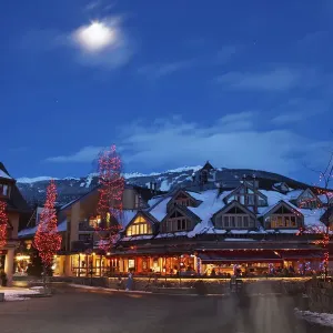 Canada, British Columbia, moon over Whistler Village at dusk Canada, British Columbia, moon over Whistler Village at dusk