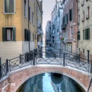 Canal with bridge in the center of Venice - Italy Canal with bridge in the center of Venice - Italy