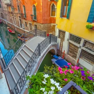 Canal and footbridge in Venice Canal and footbridge in Venice