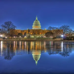 Capitol Building reflecting in lake