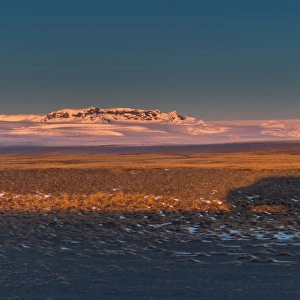 a car shadow cast on an iceland landscape