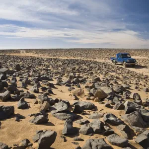 Car track in stone desert, Akakus Mountains, Libya, Sahara, North Africa Car track in stone desert, Akakus Mountains, Libya, Sahara, North Africa