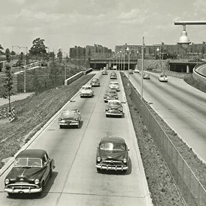 Cars on two lane highway, (B&W), elevated view