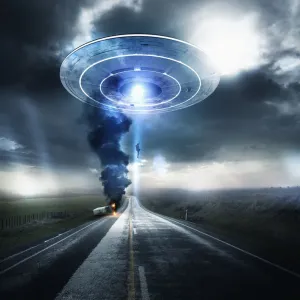 Caucasian man beaming up to UFO over highway Caucasian man beaming up to UFO over highway