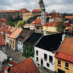 Cesky Krumlov cityscape with castle and tower in the background, South Bohemia, Czech Republic