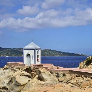Chapel on the coast, Isola Spargi in back, Maddalena, National Park La Maddalena