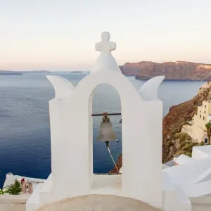 Church bell tower in Oia village, Santorini, Cyclades, Greece Church bell tower in Oia village, Santorini, Cyclades, Greece