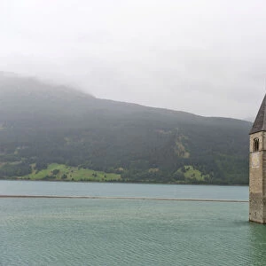 Church tower in the Reschensee lake, Graun im Vinschgau, South Tyrol province, Trentino-Alto Adige, Italy