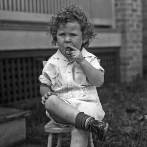 Cigar-Smoking Child