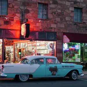 Classic car and neon signs in Williams at night along Route 66 Classic car and neon signs in Williams at night along Route 66