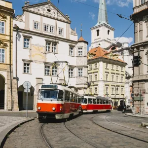 Classic red tram on the streets of Lesser own (Mala Strana) in Prague, Czech Republic