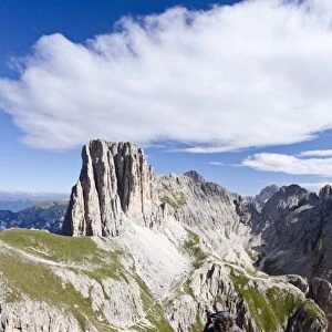 Climbers during the ascent to the Croda Rossa in the Rose Garden Group over the Croda Rossa via ferrata, below the Vaiolonpass, behind the Tscheiner peaks, Dolomites, Province of South Tyrol, Italy