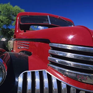 Close up of front of red classic car, New Mexico, USA