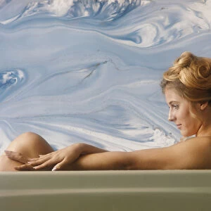 Close Up of a Woman sitting in Bath Tub