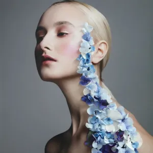 Collage with female portrait and blue flowers Collage with female portrait and blue flowers