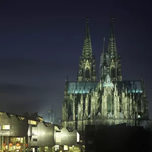 Cologne Cathedral and Philharmonie philharmonic hall at night, illuminated, Cologne, North Rhine-Westphalia, Germany, Europe