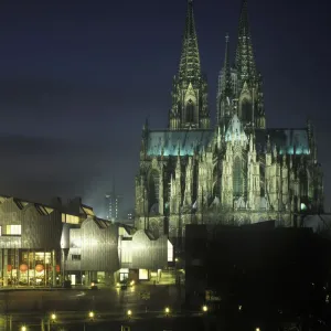 Cologne Cathedral and Philharmonie philharmonic hall at night, illuminated, Cologne, North Rhine-Westphalia, Germany, Europe Cologne Cathedral and Philharmonie philharmonic hall at night, illuminated, Cologne, North Rhine-Westphalia, Germany, Europe