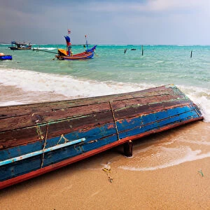 Colorful fishing boats at shores of Natien