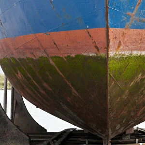 Coloured hull covered with algae in the dry dock, Hvide Sande, Jutland, Denmark, Europe