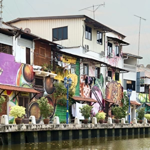 Colourful houses line Melaka River