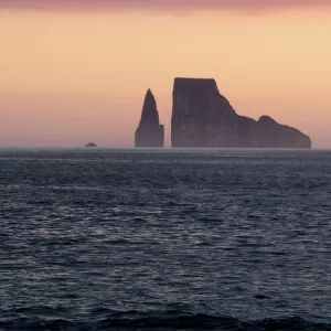 Colourful sunset behind Kicker Rock, Galapagos