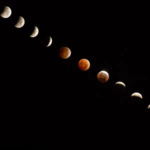 Composite of Total Lunar Eclipse in a dark sky