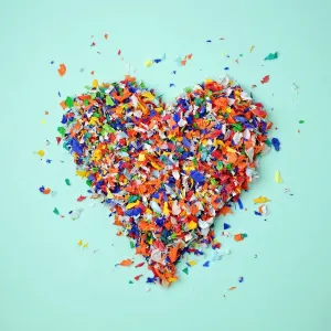 Multicolored Confetti Heart Print on Light Blue Background Multicolored Confetti Heart Print on Light Blue Background