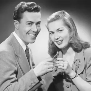 Black and White Studio Print of Couple Pulling Wishbone Black and White Studio Print of Couple Pulling Wishbone