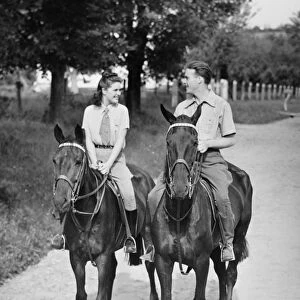 Couple riding horses (B&W)