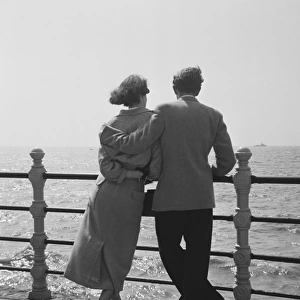 Couple Watching The Sea on Blackpool Promenade