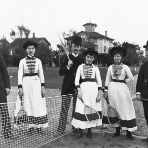 Couples Standing on Tennis Court Couples Standing on Tennis Court