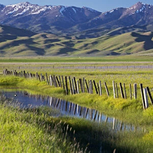 Creek and fence in Camas Prairie, Fairfield, Idaho, USA