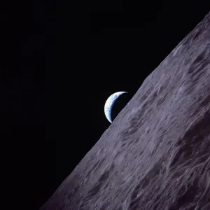 Crescent Earth rises above the lunar horizon in this picture from the Apollo 17 Crescent Earth rises above the lunar horizon in this picture from the Apollo 17