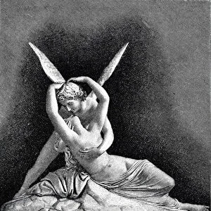 Cupid and psyche statue embracing each other with spread wings