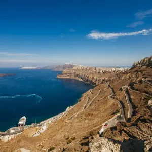 Curved road to Athinios port, Santorini, Greece Curved road to Athinios port, Santorini, Greece