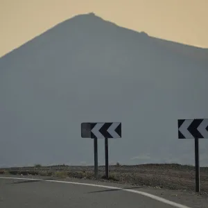 Curvy road in the wine growing region of La Geria, Lanzarote, Canary Islands, Spain