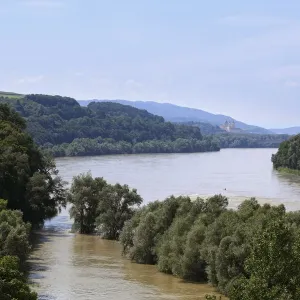 Danube River with Schloss Schoenbuehel Palace, in the distance, Melk Abbey, Wachau, Mostviertel, Lower Austria, Austria, Europe Danube River with Schloss Schoenbuehel Palace, in the distance, Melk Abbey, Wachau, Mostviertel, Lower Austria, Austria, Europe