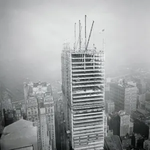 Distant View of Workers Atop Skyscraper Distant View of Workers Atop Skyscraper