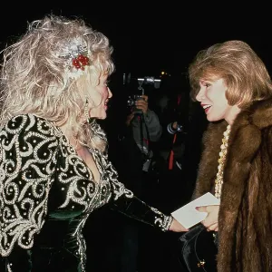 Dolly Parton And Joan Rivers Attend Sandy Gallin's Christmas Party
