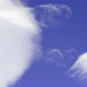 Dramatic clouds in blue sky, South Georgia Island