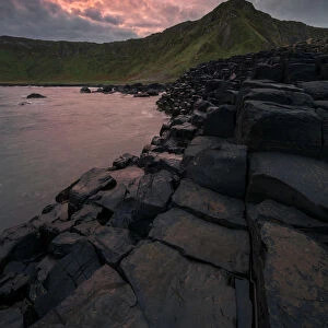 Dramatic sunrise at Giants Causeway in Northern Ireland