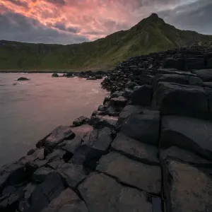Dramatic sunrise at Giants Causeway in Northern Ireland Dramatic sunrise at Giants Causeway in Northern Ireland