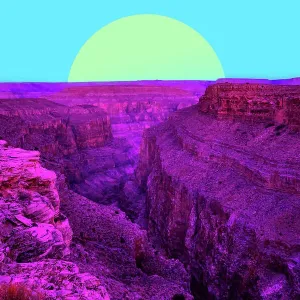Dreamy colorful view of the Grand Canyon with saturated colors and big sun Dreamy colorful view of the Grand Canyon with saturated colors and big sun