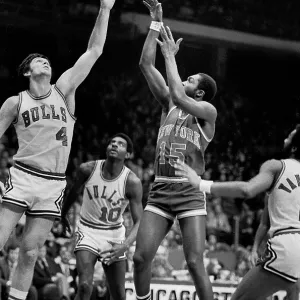Earl Monroe of the New York Knicks guards Norm Van Lier of the Chicago Bulls in the 1974-1975 season at the Chicago Stadium in Chicago, Il Earl Monroe of the New York Knicks guards Norm Van Lier of the Chicago Bulls in the 1974-1975 season at the Chicago Stadium in Chicago, Il
